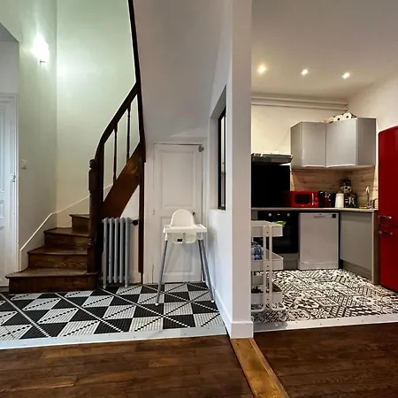 Small House On 2 Levels Near The Heart Of Town And Its Interior Terraces