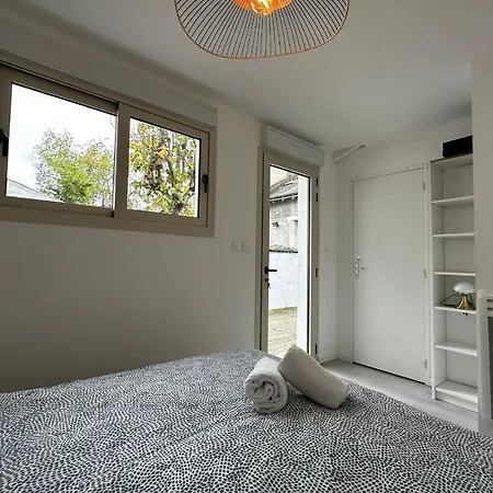 Small House On 2 Levels Near The Heart Of Town And Its Interior Terraces *
