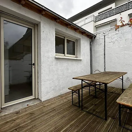 Small House On 2 Levels Near The Heart Of Town And Its Interior Terraces *