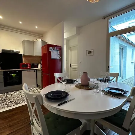 Small House On 2 Levels Near The Heart Of Town And Its Interior Terraces